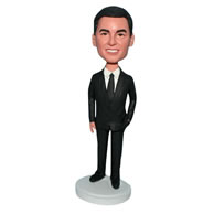 Business man in black suit bobblehead