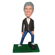 Smiling man in coffee coat matching with jeans bobblehead