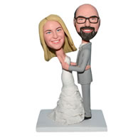 Groom in grey suit and bride in white wedding dress bobblehead
