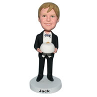 Young boy in black suit bobblehead