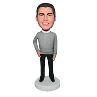 Man in grey sweater matching with black pants bobblehead