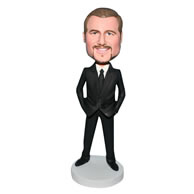 Handsome man in black suit bobblehead