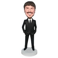 Handsome man in black suit bobblehead