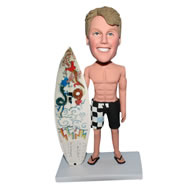 Man in shorts and surf board bobblehead
