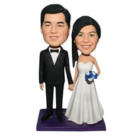 Groom in black suit carrying his bride in white wedding dress custom bobblehead