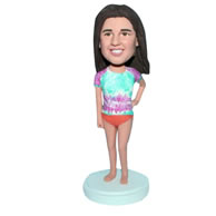 Long hair woman in colorful shirt bobblehead