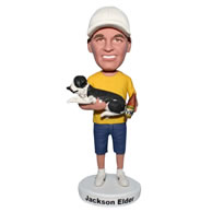 Custom man in yellow shirt carrying his pet dog  bobble head