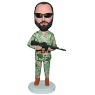 Custom soldier in battle fatigues handing a gun  bobble head