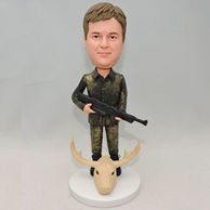 Personalized hunter custom bobbleheads with a gun in his hand