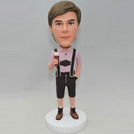 Custom bobblehead with a cup in his hand