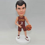 Basketball bobblehead in red jersey with a ball