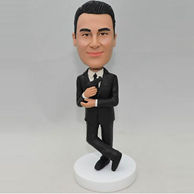 Custom bobblehead with a gun in his hand