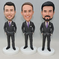 Groomsmen bobbleheads in grey suit and purple tie