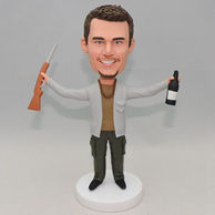 Custom man bobblehead holding a gun and a beer