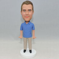 Blue shirt and tan pants bobblehead with black shoes