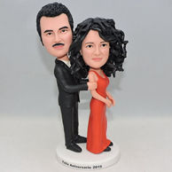 Creative coulpe bobbleheads with orange braces skirt