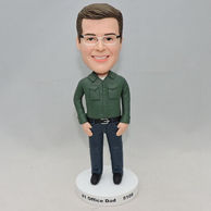 Dark green shirt man bobblehead with white glasses