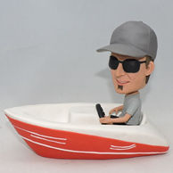 Creative red boat bobbleehad with grey hat