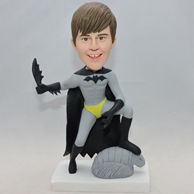 Custom batman bobblehead with a owl under his feet.