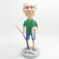 Fisherman bobblehead with green shirt and black flip-flops