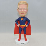 Personalized superman bobblehead in red uniforms with a cloak