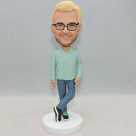 Custom bobblehead wear glasses with his legs crossed