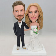 Personalized sweet wedding bobbheads with beautiful flowers