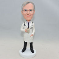 Personalized doctor bobblehead with a cup of tea on his hand