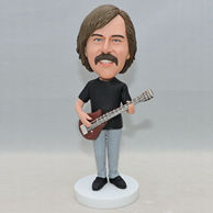 Custom bobbleheads for men who like playing guitar