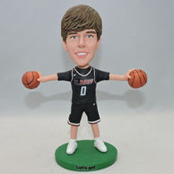 Custom basketball player in black jersey with a ball in each hand