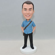 Custom men bobbleheads with a messenger bag on his shoulder