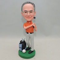 Personalized Men Bobbleheads in orange shirt and holding a golf club