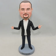 Custom man bobblehead with black coat and blue pants