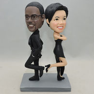 Personalized partner Bobbleheads in black suit and black dress