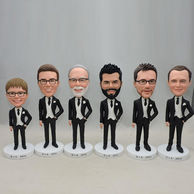 groomsmen bobbleheads one hand in pocket in black suit