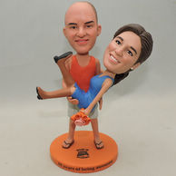 Custom Couple Bobbleheads man hug the woman with the flower on hands