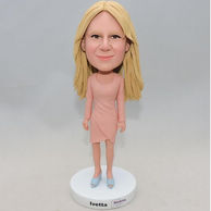 Personalized Woman Bobbleheads standing in pink dress and light blue shoes