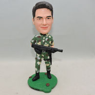 Custom Men Bobbleheads hold gun with green uniform and black shoes