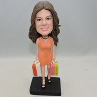 Woman Bobbleheads Custom with orange dress and holding bags