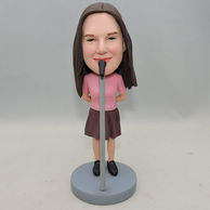 Personalized Girls Bobbleheads singing before the microphone with pink shirt
