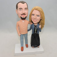 Custom Couple Bobbleheads standing together with stylish clothing