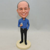 personalized boss bobblehead holding a cell phone