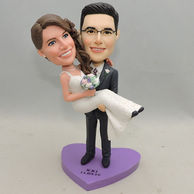 Sweet wedding bobblehead gift with purple heart base