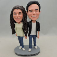 Custom couple bobblehead with couples blue jeans and lady with wavy hair