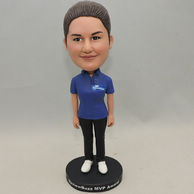 Lady bobblehead with blue shirt and black pants