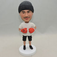 Custom-made boxer bobblehead with white orange boxing gloves