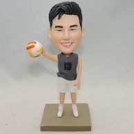 Volleyball player bobblehead hand with ball