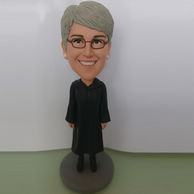 Woman bobblehead with Long black robes