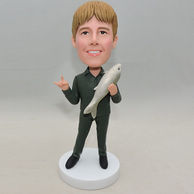 Fisher bobblehead with fish in hand