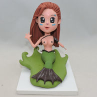 Charming mermaid bobblehead leap out of the water